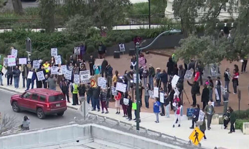 Dozens protest in San Antonio against immigration enforcement on Trump’s one-year mark in office