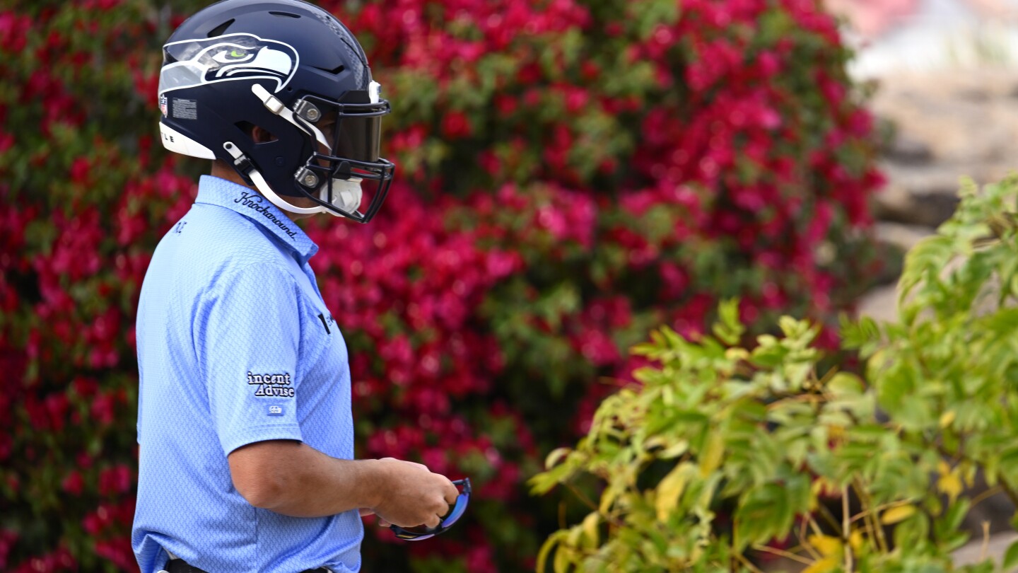 Football helmet on the golf course? Joel Dahmen shows Seahawks pride at WM Phoenix Open