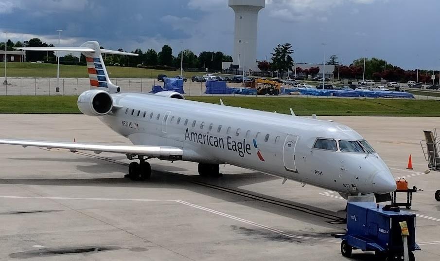 CRJ700 diverts after radome apparently holed during Washington take-off