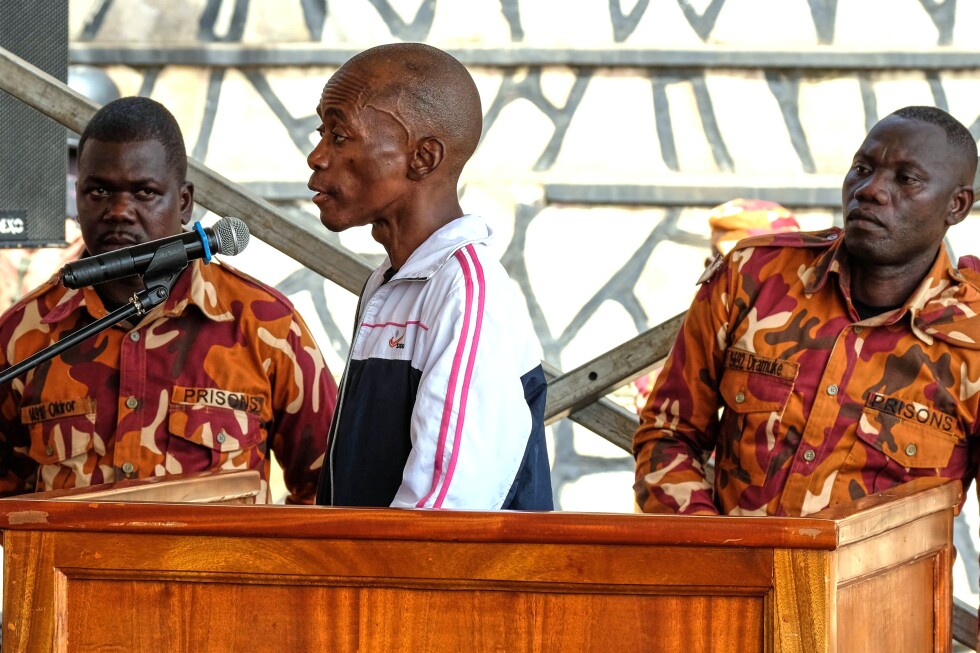A man accused of killing 4 kids in Uganda is being tried in a tent near the crime scene