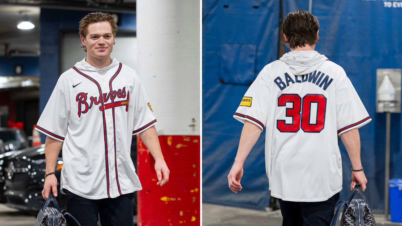 Caufield rocks childhood friend Drake Baldwin’s jersey before game