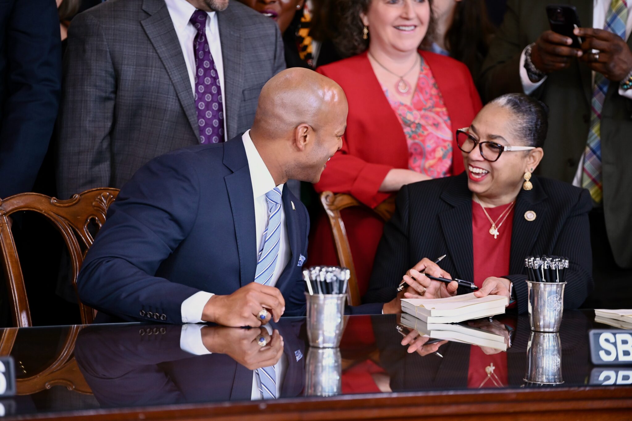 Moore, legislative leaders sign $70.8 billion budget into law