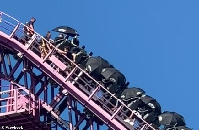 Riders get rescued from the DC Rivals HyperCoaster at Movie World on the Gold Coast on Wednesday