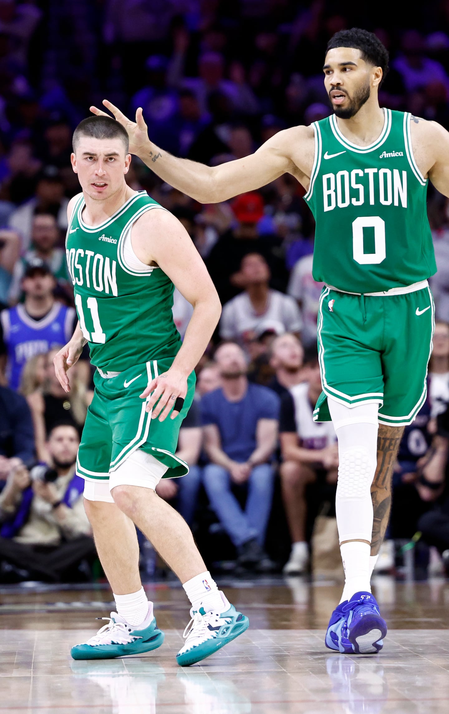 Payton Pritchard and Jayson Tatum react after Pritchard's clutch fourth-quarter shot.