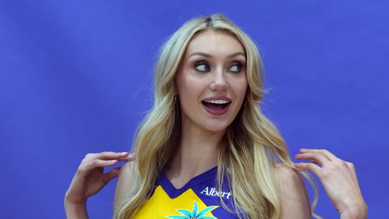 Cam Brink shows off tiny waist in ‘jungle baby’ swimsuit shoot