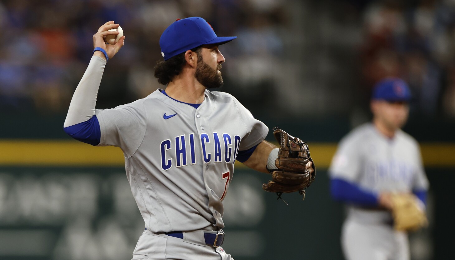 Cubs shortstop Dansby Swanson treats his glove with love