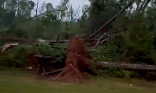 Debris blocks parts of highway after violent tornado