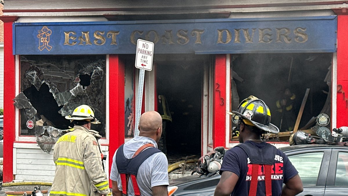 East Coast Divers fire in Brookline leaves worker, firefighter hurt – NBC Boston