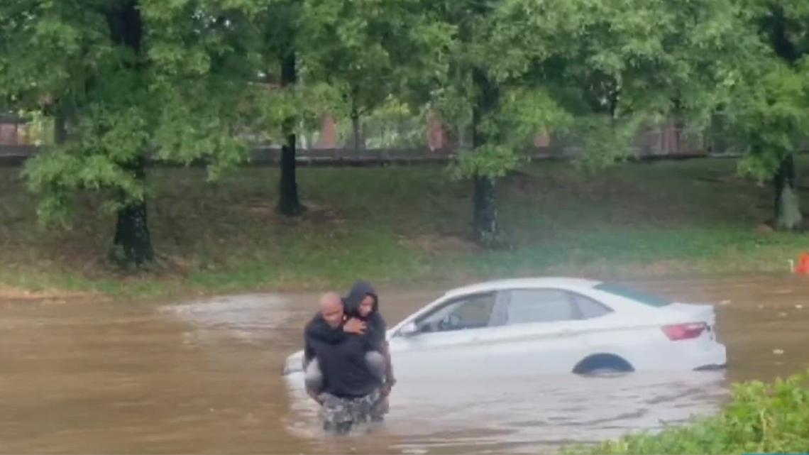 Georgia veteran rescues woman stranded on roof of car during major Atlanta floods on Downtown Connector