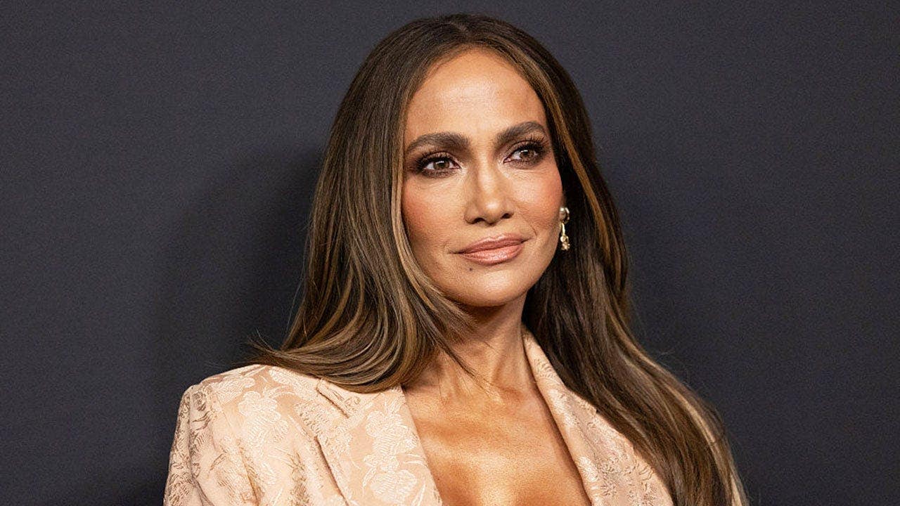Jennifer Lopez’s dress holds on for dear life at her Netflix event, Trump powers through some wine & Kay Adams