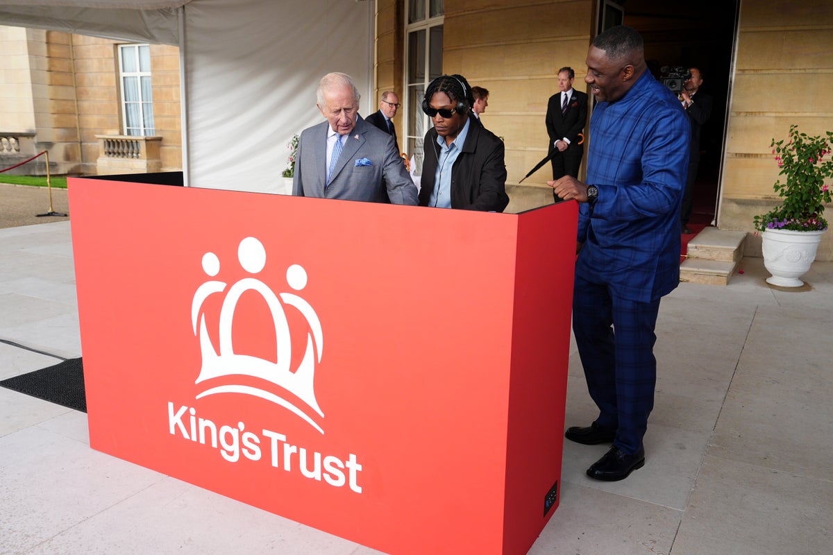 King Charles takes to the DJ decks with Idris Elba at Buckingham Palace garden party