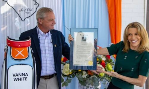 NMB honors Vanna White with personalized golf bag, plaque