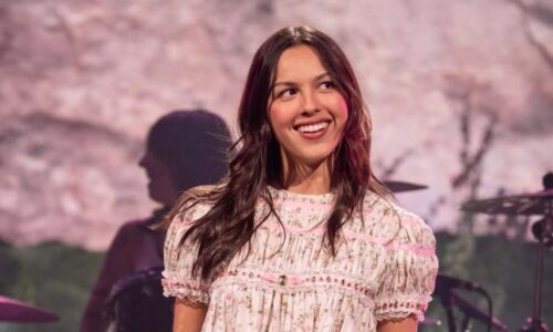 Olivia Rodrigo Performs in Barcelona in a Babydoll Dress and Boots