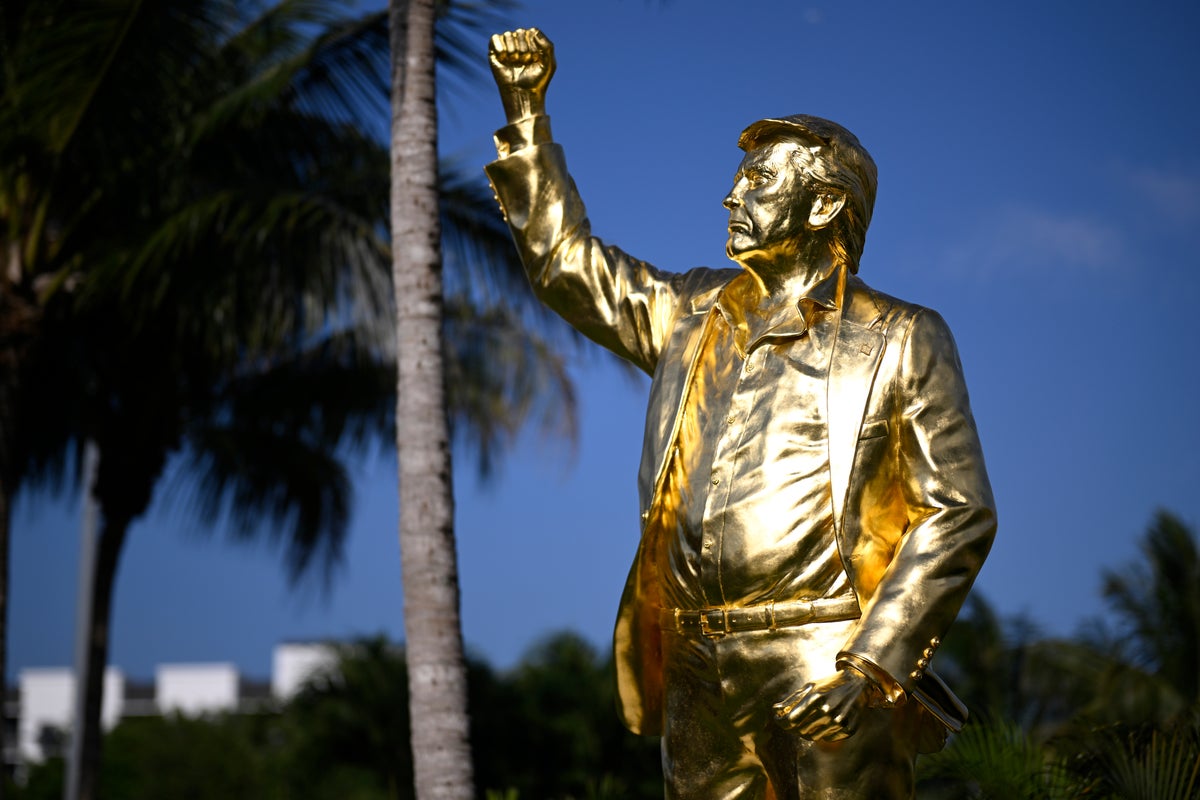 Pastor leads wild dedication ceremony for Trump’s giant gold statue at his own golf course