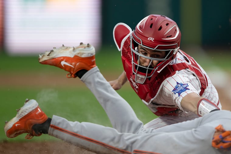 Philadelphia Phillies catcher Garrett Stubbs attempts to tag San Francisco Giants’ Casey Schmitt as he scores a run in the fifth inning of the second game of a doubleheader on Thursday, April 30, 2026, at Citizens Bank Park in Philadelphia.