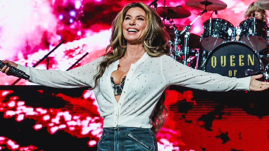 Shania Twain turns heads in lingerie-style dress as she hints at new music
