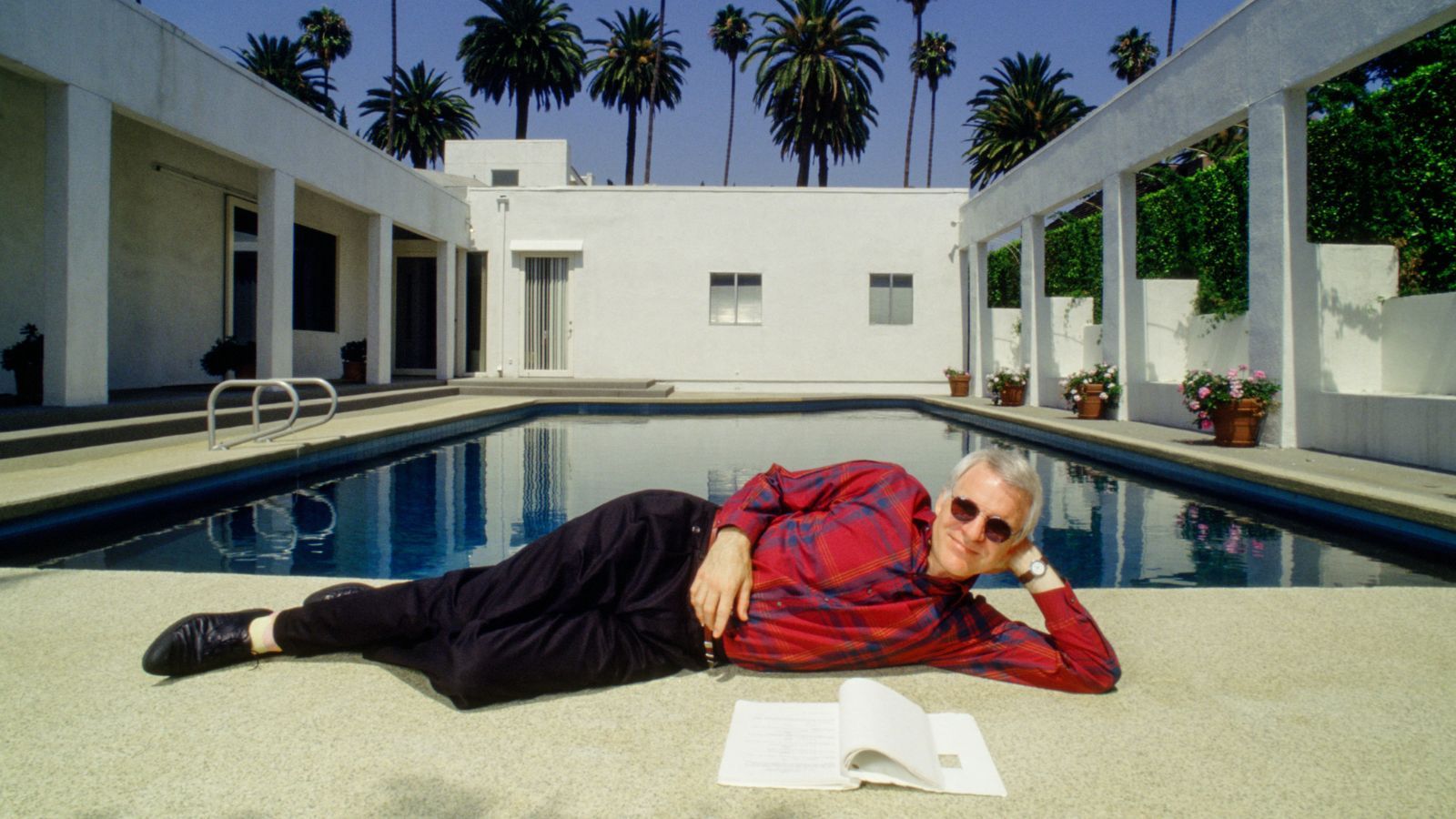 Steve Martin’s Pool Is a Masterclass in Potted Plant Design