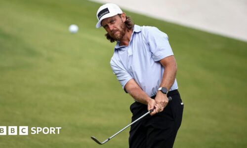 Tommy Fleetwood playing a chip shot